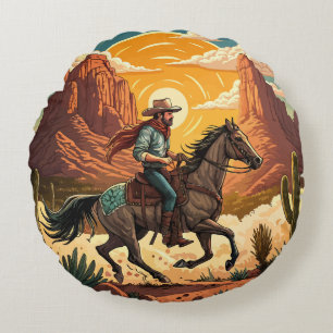 Cowboy reitet auf Pferd bei Sonnenuntergang Rundes Kissen