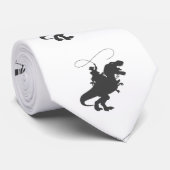 Cowboy riding dinosaur in the prehistoric wird krawatte (Gerollt)