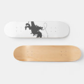 Cowboy riding dinosaur in the prehistoric wird skateboard (Horizontal)