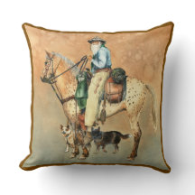 Cowboy und Appaloosa Pferd mit Dogien