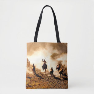 Cowboys jagen wilde Pferde. Seil und Reiten, Tasche