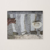 Cowboystiefel und Hut außerhalb der Blockhütte Puzzle (Horizontal)