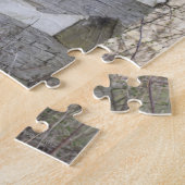 Cowboystiefel und Hut außerhalb der Blockhütte Puzzle (Seite)