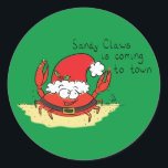 Crab Christmas Tropical Funny Runder Aufkleber<br><div class="desc">Erzählen Sie all Ihren tropischen Strandfreunden,  dass Sandy Claws Weihnachten in die Stadt kommt! Er ist eine Krabbe,  also mach nicht diese Weihnachtsmannschaft,  sonst bekommst du in diesem Urlaub Kohle! Es ist der perfekte niedliche Cartoon,  um die Strandliebhaber zu Weihnachten zum Lächeln zu bringen!</div>