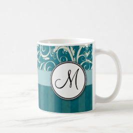 Creme auf aquamarinen Blumenbündeln u. Streifen Kaffeetasse