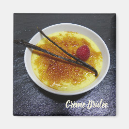 Creme brulae auf Tonschiefer mit Himbeere und Vani Magnet