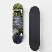 Creme fließt durch den Wald Skateboard (Vorderseite)