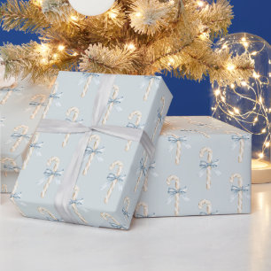 Creme-Zuckerstangen Blaue Schleife Weihnachten Geschenkpapier