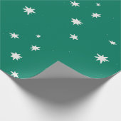 cremefarbene Sterne auf Grün Geschenkpapier (Ecke)