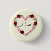 Crèmefarbenes Abzeichen mit einem rosa und roten H Button (Vorderseite)