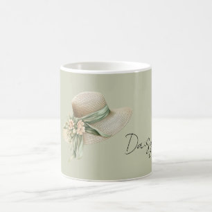 Cremehut mit grünem Band und Pfirsichblumen Kaffeetasse