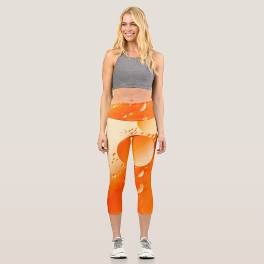 Cremes orangefarbenes, kreisförmiges abstraktes De Capri Leggings (Vorderseite)