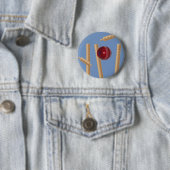 Cricketball und Stumps, Button (Beispiel)
