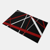 Criss quere rote und weiße Linien auf schwarzem Fußmatte (Schrägansicht)