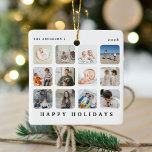 Custom 12 Foto Collage Happy Holidays Weihnachten Keramikornament<br><div class="desc">Mit diesem modernen Foto-Gitter-Collage und Text kreieren Sie Ihre ganz eigenen Weihnachtsschmuck. Das Design umfasst 12 (zwölf) Bilder Ihrer Wahl, den Text 'HAPPY HOLIDAYS', Familienname und Jahr. Das ist ein großartiges Geschenk für Freunde, Familie oder sich selbst diese Weihnachten. FOTO TIPP: Crop und Mitte Ihre Bilder vor dem Hochladen für...</div>