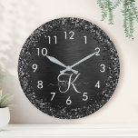 Custom Black Glitter Sparkle Monogram Große Wanduhr<br><div class="desc">Easily personalize this trendy elegant clock design featuring pretty black sparkling glitter on a black brushed metallic background.</div>