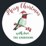 Custom Christmas Hummingbird Runder Aufkleber<br><div class="desc">Dieser personalisierte Weihnachtsaufkleber ist mit einem handillustrierten Kolibri ausgestattet,  der eine Weihnachtsmannmütze trägt. Fügen Sie Ihren Geschenken,  Briefen oder Zuhause-gefertigten Waren eine einzigartige Touch hinzu.</div>