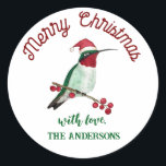 Custom Christmas Hummingbird Runder Aufkleber<br><div class="desc">Dieser personalisierte Weihnachtsaufkleber ist mit einem handillustrierten Kolibri ausgestattet,  der eine Weihnachtsmannmütze trägt. Fügen Sie Ihren Geschenken,  Briefen oder Zuhause-gefertigten Waren eine einzigartige Touch hinzu.</div>