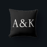 Custom Initials on Black Wedding Kissen<br><div class="desc">This custom throw pillow features a clean, modern, and elegant design. Sample initials of the bride and groom are printed in the center in a sophisticated white font. The background is a solid black. You can personalize the pillow to include your own custom initials or other text of your choice....</div>