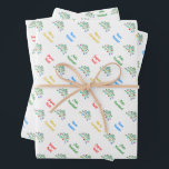 Custom Multilingual Merry Christmas Wrapping Paper Geschenkpapier Set<br><div class="desc">Custom Multilingual frohe Weihnachtswrapping Papier. Auf den internationalen Weihnachtsblättern findet man einen festlich grünen Weihnachtsbaum, der mit farbenfrohen Ornamenten geschmückt ist, sowie den Satz "Frohe Weihnachten" in vier Sprachen: Französisch (Joyeux Noël!), Italienisch (Buon Natale!), Englisch (Frohe Weihnachten!) und Spanisch (Kostüm Feliz Navidad!). Die Feiertagsgrüße sind anpassbar, sodass Sie sie in...</div>