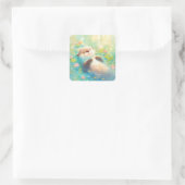 Cute Baby Otter Floating in Sunlit Blue Pond Quadratischer Aufkleber (Tasche)