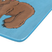 Cute bear with flower cartoon illustration schneidebrett (Ecke)