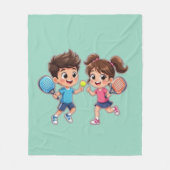 Cute Cartoon Boy and Girl Playing Padel Tennis – F Fleecedecke (Vorderseite)