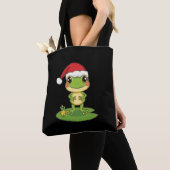 Cute Cartoon Frog Character Wearing a Santa Hat on Tasche (Von Nahem)