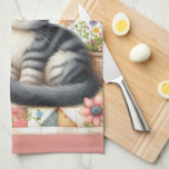 Cute Cat on Floral Quilt Cottagecore Geschirrtuch<br><div class="desc">A delightful gray tabby kitten sits sweetly among blooming flowers in this cozy, cottagecore-inspired design. The backdrop features a vibrant patchwork quilt filled with charming geometric patterns, soft pastels, and vintage textures that evoke feelings of warmth and nostalgia. Surrounding the kitten are blooming sunflowers, roses, and daisies, along with cheerful...</div>
