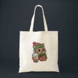 Cute Christmas Cat Tote Bag Tragetasche<br><div class="desc">This cute kawaii Christmas cat tote bag features an adorable festive kitty wearing a winter hat and holding a holiday gift and iced coffee. The playful illustration makes this bag perfect for cat lovers,  coffee fans,  and anyone who enjoys cozy winter aesthetics.</div>