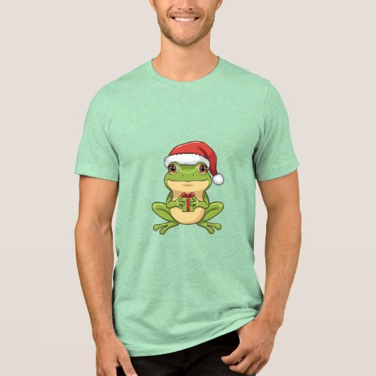 Cute Christmas Frog with Santa Hat Holding Gift - Tri-Blend Shirt (Vorderseite)