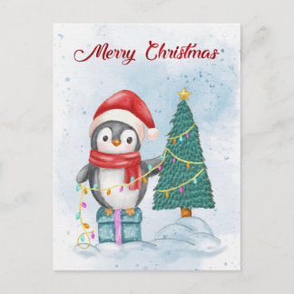 Cute Christmas Penguin Decorating Tree with Lights Feiertagspostkarte
