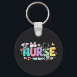 Cute Easter Nurse Medical Humor Schlüsselanhänger<br><div class="desc">Colorful lettering with a nurse hat,  stethoscope,  flowers and playful medical symbols. A cheerful graphic celebrating caring nurses and healthcare professionals during the Easter season with a bright and friendly hospital atmosphere.</div>