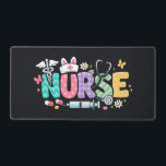Cute Easter Nurse Medical Humor Schreibtischunterlage<br><div class="desc">Colorful lettering with a nurse hat,  stethoscope,  flowers and playful medical symbols. A cheerful graphic celebrating caring nurses and healthcare professionals during the Easter season with a bright and friendly hospital atmosphere.</div>