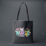Cute Easter Nurse Medical Humor Tasche<br><div class="desc">Colorful lettering with a nurse hat,  stethoscope,  flowers and playful medical symbols. A cheerful graphic celebrating caring nurses and healthcare professionals during the Easter season with a bright and friendly hospital atmosphere.</div>
