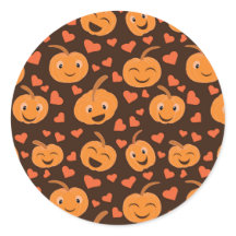 Cute funny pumpkins pattern with heart shapes