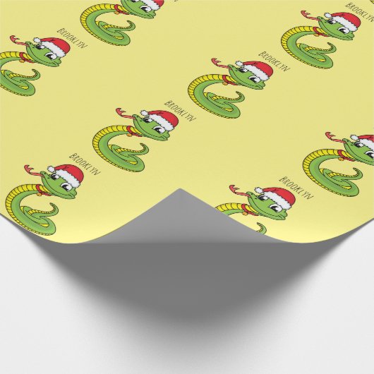 Cute green snake with santa hat cartoon geschenkpapier (Ecke)