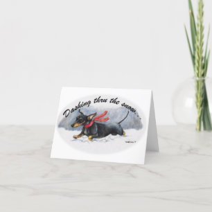 Dachshund durch den Schnee stürmend Weihnachtskart Karte