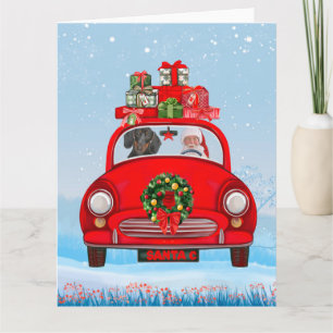 Dachshund-Hund im Auto mit dem Weihnachtsmann  Karte