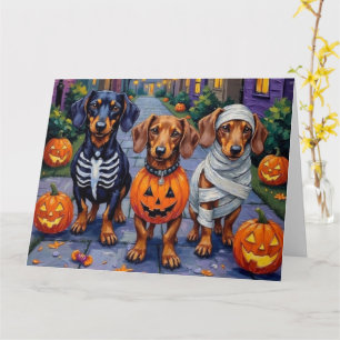Dachshund-Hunde beim Trick-or-Treat an Halloween Karte