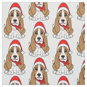 Dachshund-Jagdhund in der Weihnachtsmannmütze am Stoff