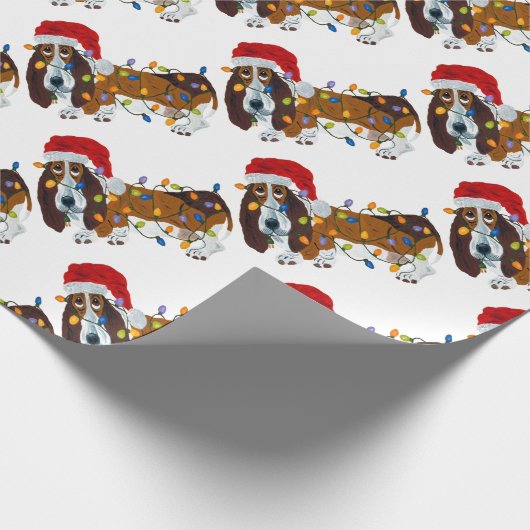 Dachshund verwirrt in den Weihnachtslichtern Geschenkpapier (Ecke)
