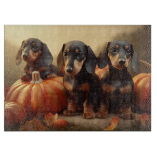 Dachshund-Welpe Herbstfreude Kürbis Schneidebrett