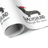 Dackel durch das Schnee-Verpackungs-Papier Geschenkpapier (Rolleneckpunkt)