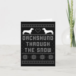 Dackel durch den schneebedeckten Weihnachtssüßer Karte