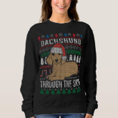 Dackel durch den schneebedeckten Weihnachtssüßer Sweatshirt (Vorderseite)