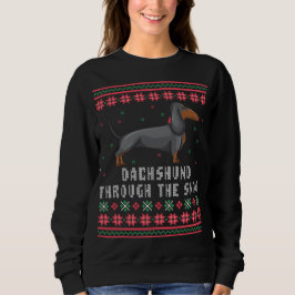 Dackel durch den schneebedeckten Weihnachtssüßer Sweatshirt