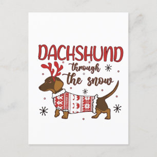 Dackel durch den schneeweihnachtlichen Hund lange Feiertagspostkarte