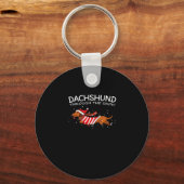 Dackel durch den schneewitzigen Hundeweihnachtskla Schlüsselanhänger (Vorderseite)