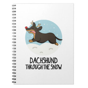 Dackel durch den sonnigen Weihnachtsabend Notizblock